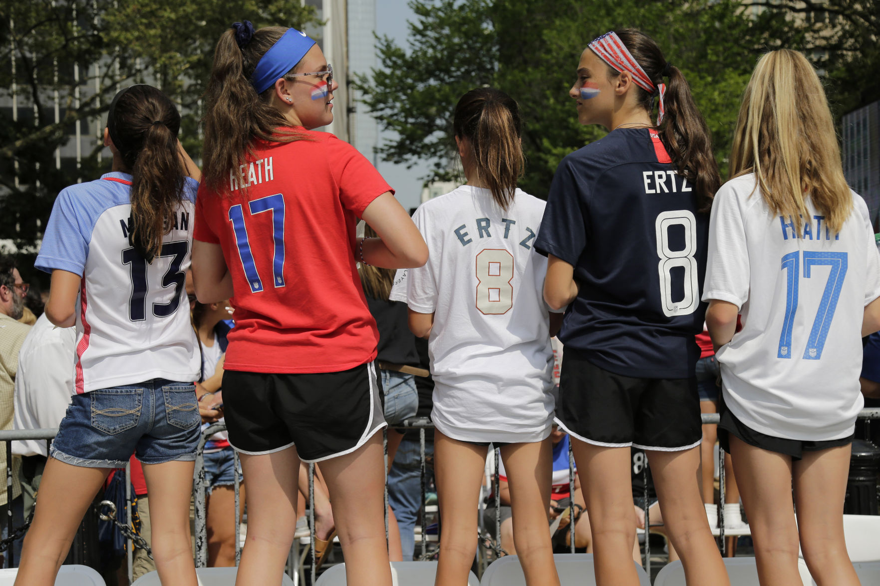 Girls in soccer jerseys